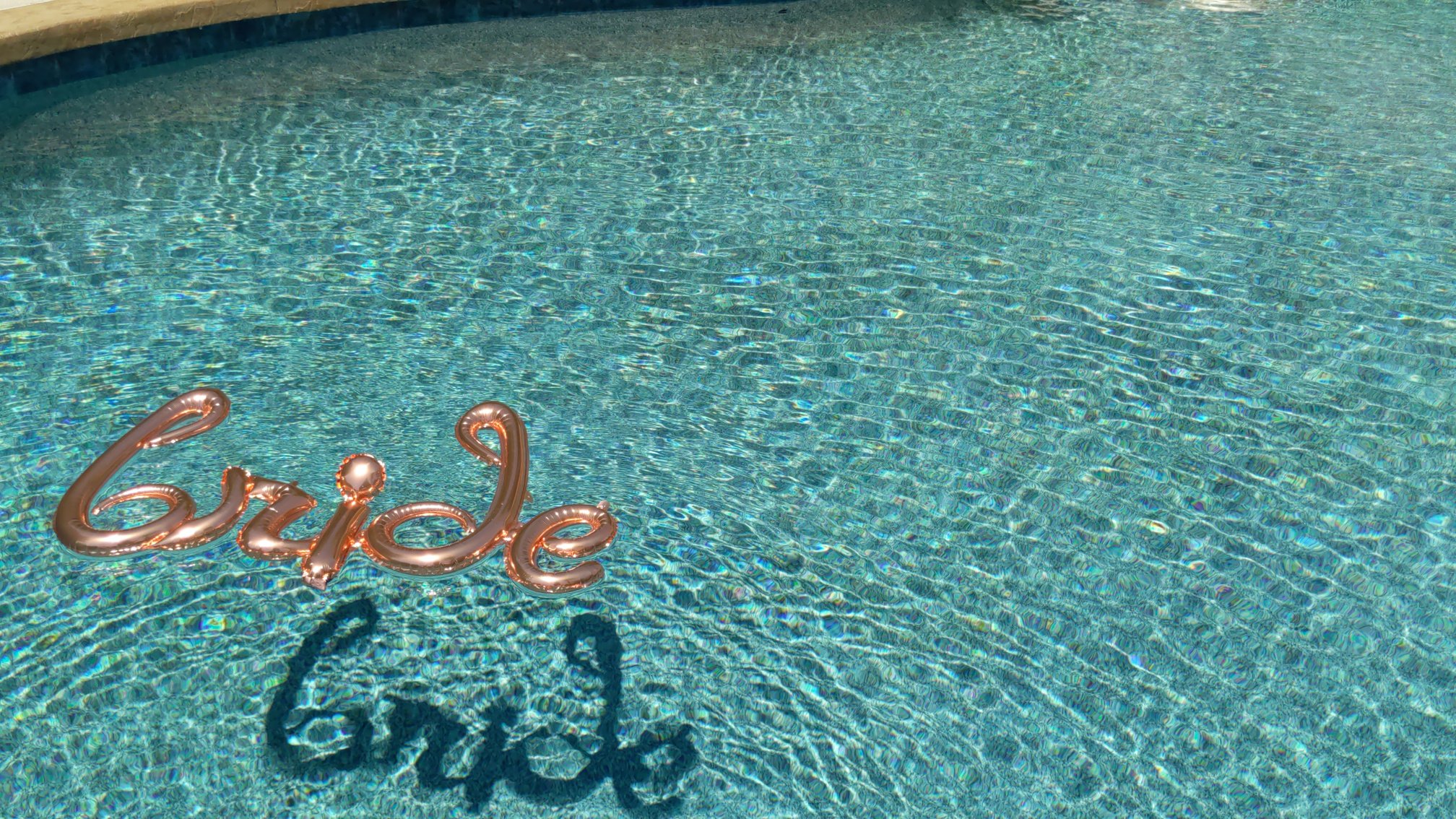 Bride Balloon Floating on Pool